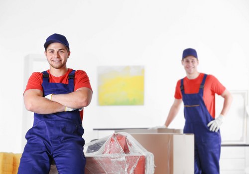 House removalists in Pimlico loading furniture into a moving truck