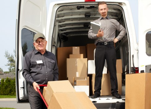 Office relocation planning in Pimlico with moving boxes and workspace setup