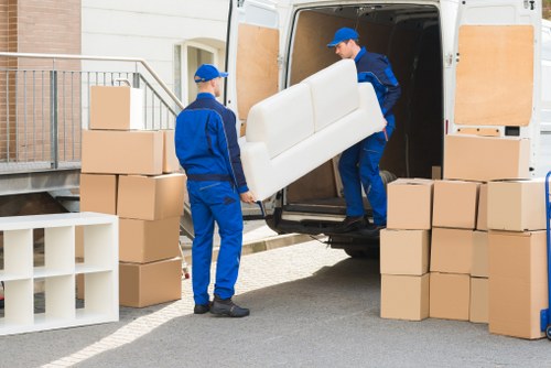 Loading furniture into a van for a Pimlico removal job