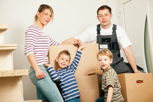 Team preparing an office relocation in Pimlico with labelled boxes and workspace setup