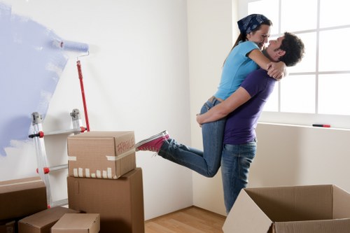 Careful handling of furniture in a Pimlico flat with stairs