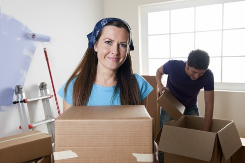 Household furniture being moved carefully during a Pimlico home removal