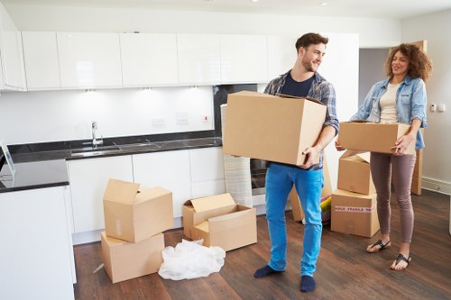 Moving day logistics with boxes and furniture in a Pimlico property