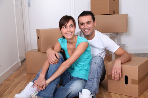 House moving day planning with labelled boxes and checklist
