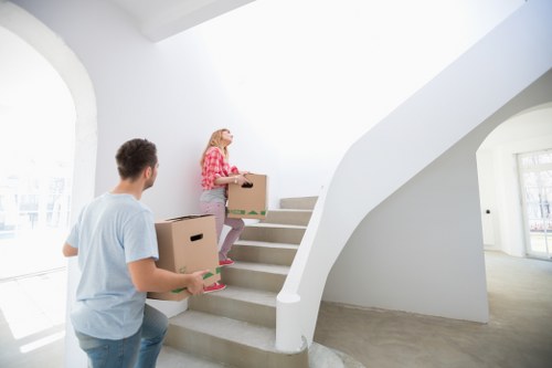 Packed moving boxes and furniture ready for removals in Pimlico